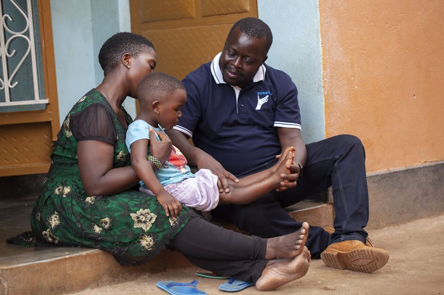 Loretta, mama en veldwerker Kenneth
